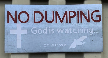 Mar 3 - Sign on a dumpster at Gold Mine Thrift Shop. Message received.